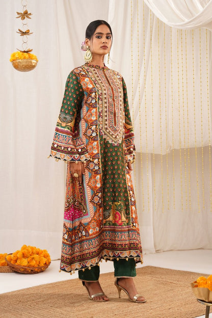 Luxurious Green Crepe Suit Festive Accents - Riwayat