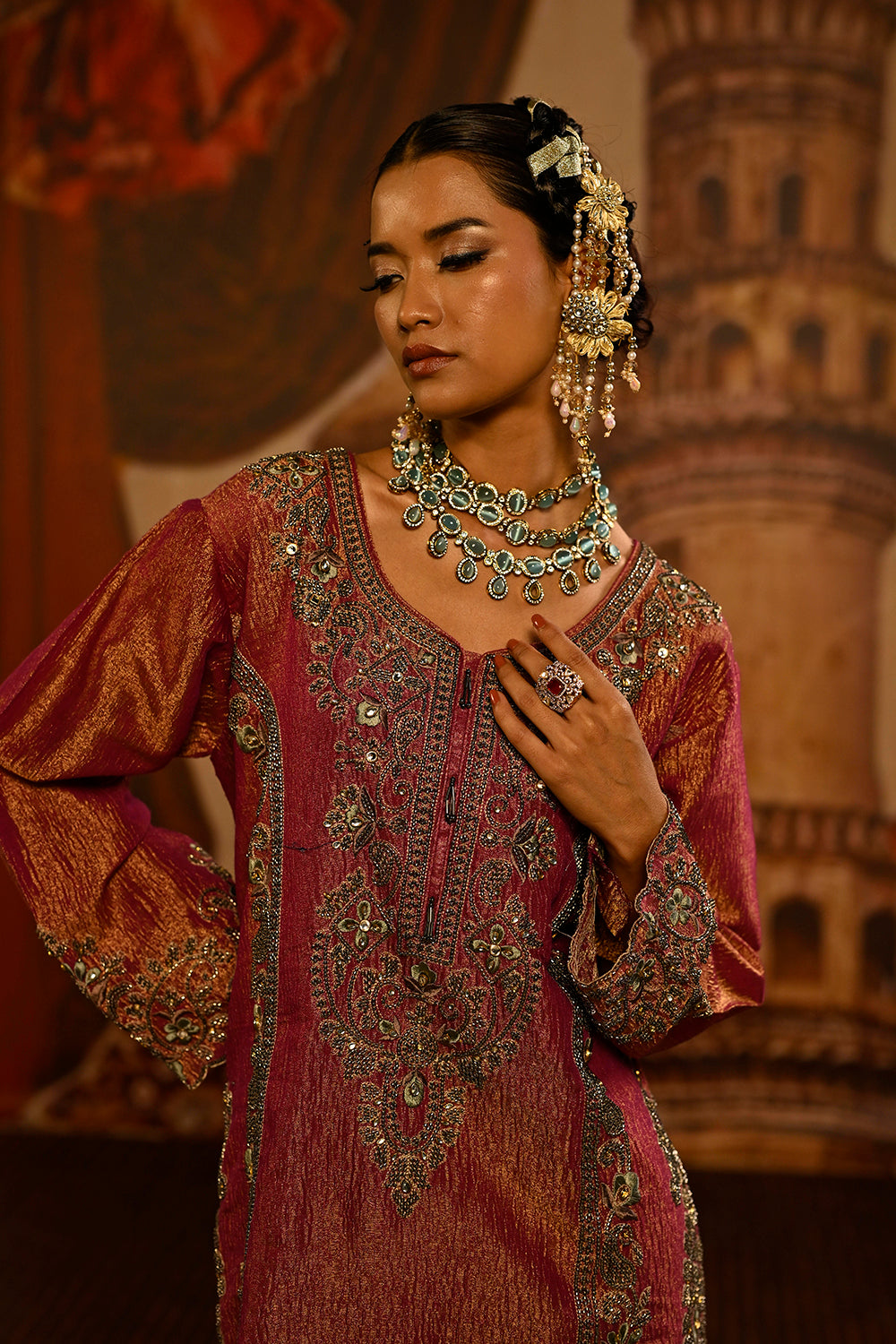 Deep Pink Tissue Kurta Set With Intricate Detailing And Contrasting Green Dupatta Elegance