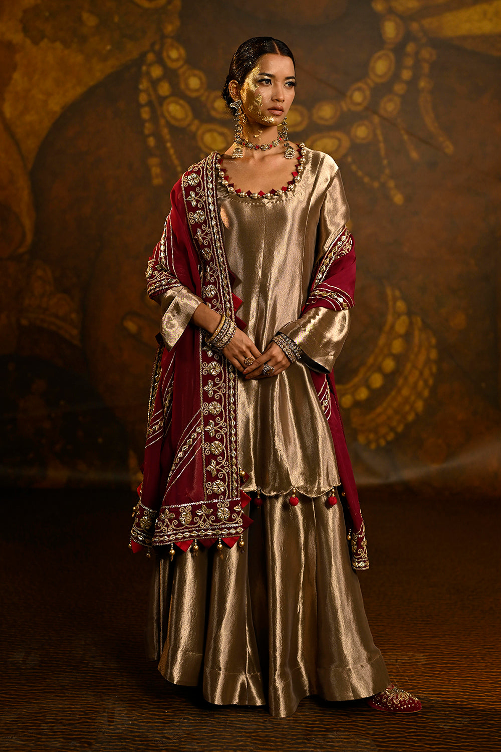 Royal Gold Banarsi Silk Tissue Sharara Set With Maroon Dupatta And Ornate Borders